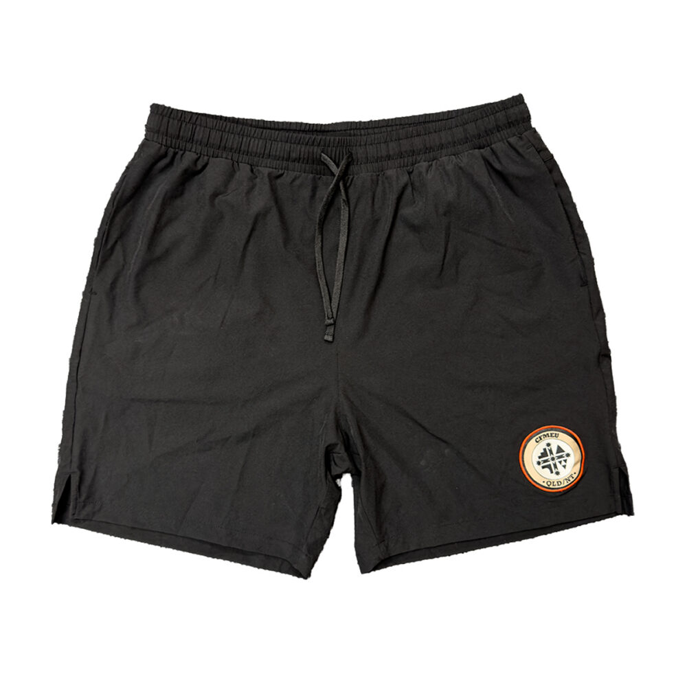Black athletic shorts with a drawstring and a circular logo patch on the lower right leg