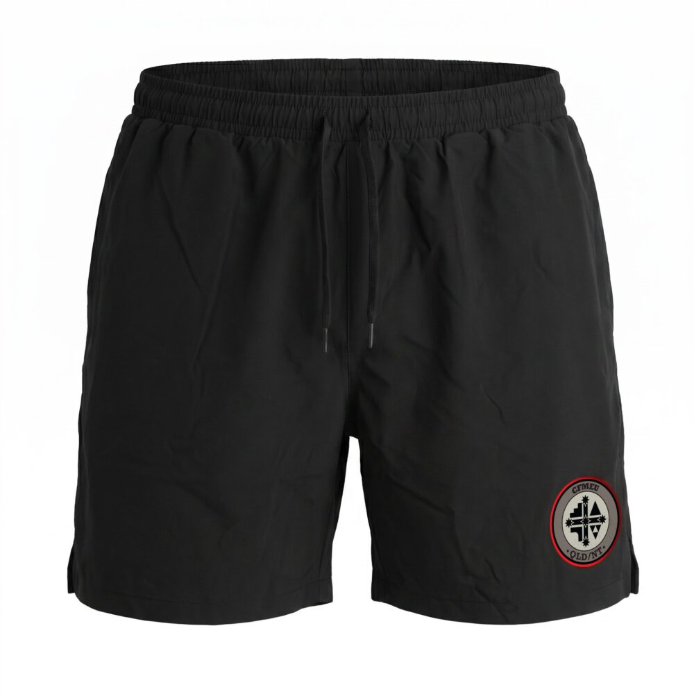 Black athletic shorts with an elastic waistband and a circular badge on the right leg.