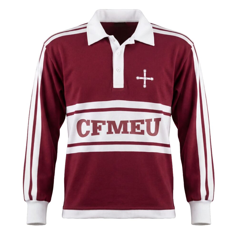 Maroon rugby shirt with white collar and stripes, small white cross emblem on the left chest area.