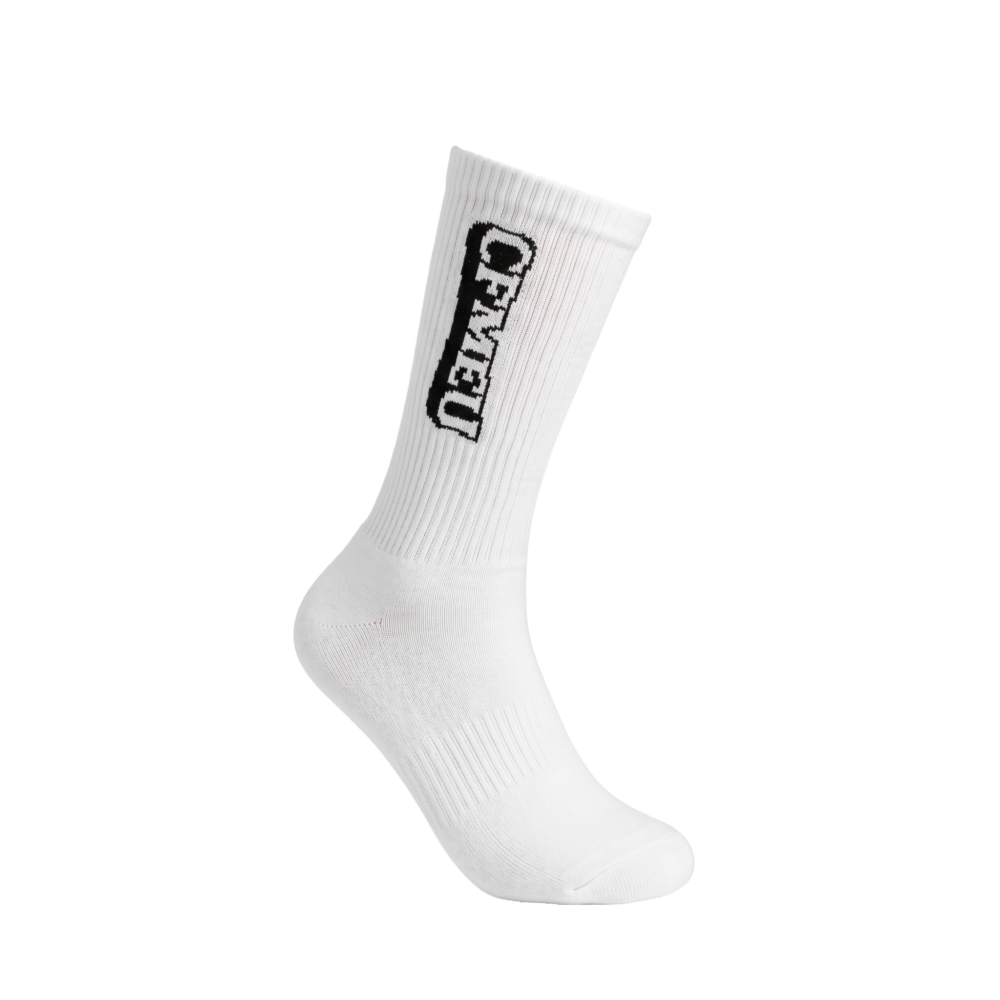 White ribbed sock stretched diagonally across a white background with a black logo along the top edge.