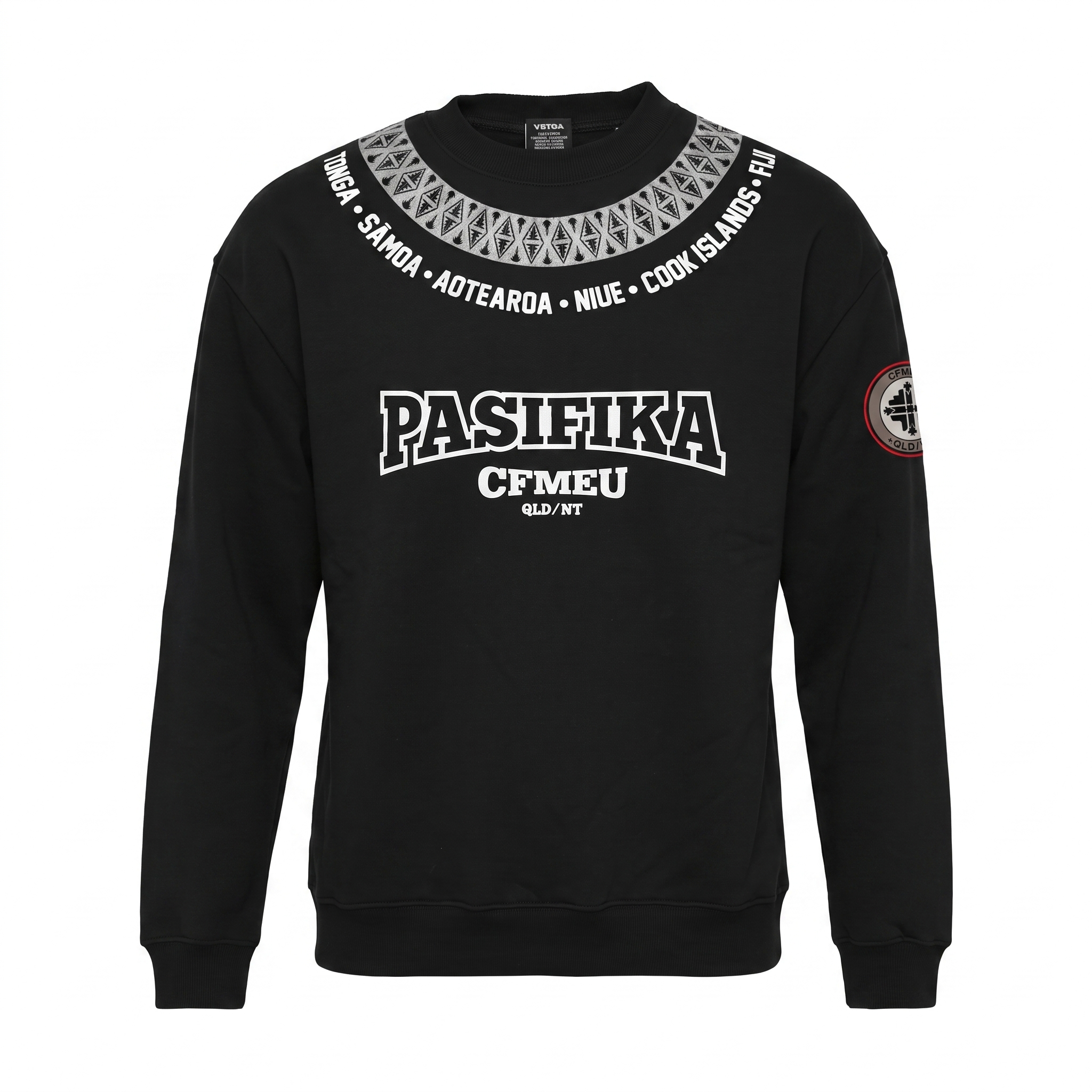 Black sweatshirt featuring bold white 'PASIFIKA' lettering across the chest and a decorative circular pattern around the neckline, with a patch on the left sleeve.