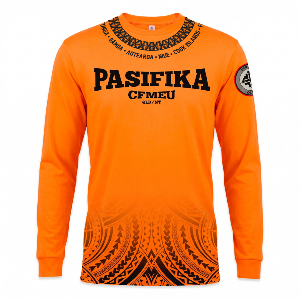 Orange long-sleeve shirt featuring bold black PASIFIKA lettering and a black tribal pattern around the neckline and down the torso, with a circular design on the chest area.